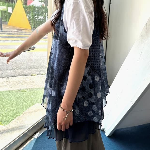Sheer fabric fake layered sleeveless top