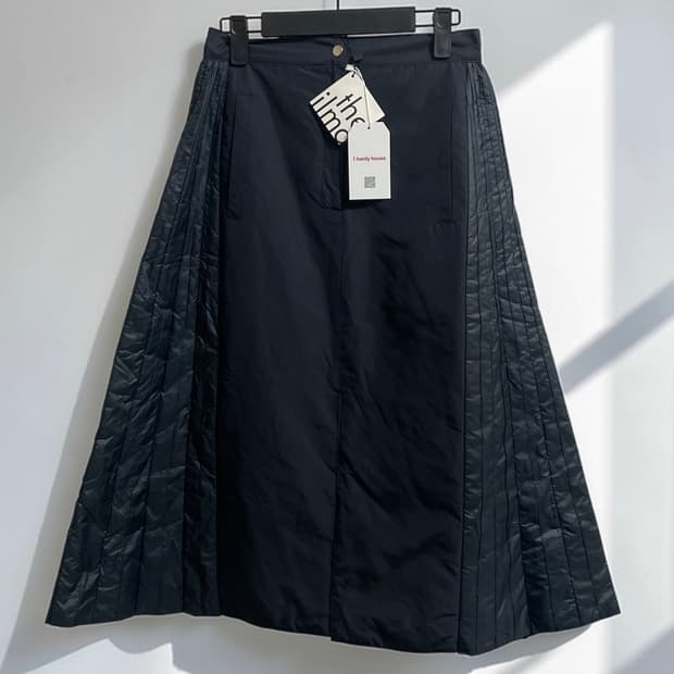 더 일마 플리츠 패널 스커트