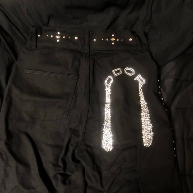 오도어 크리스 스터드 팬츠