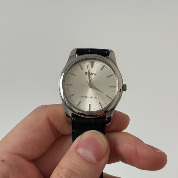2000s Sunburst Dial Silver Quartz
