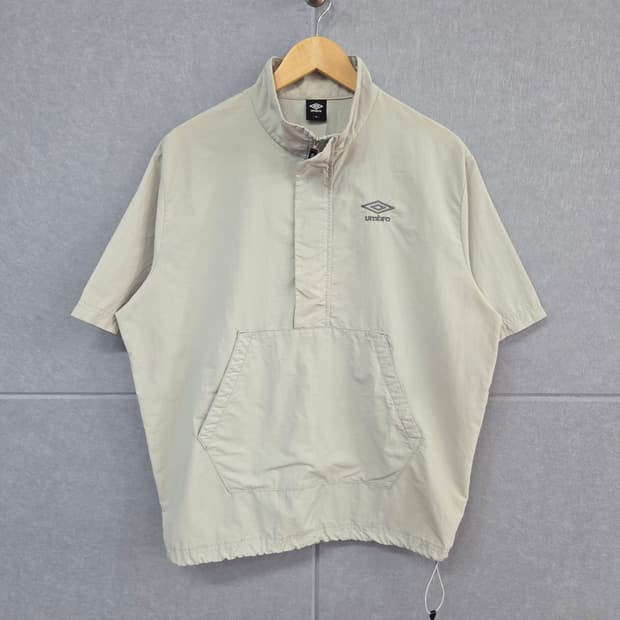 엄브로(UMBRO) 우븐 하프집업 반팔 아노락