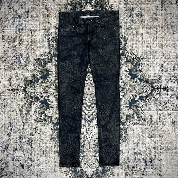 Leopard waxed skinny jeans