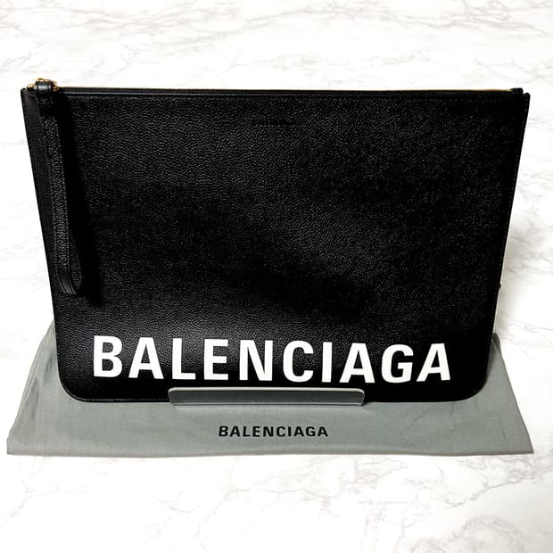 발렌시아가 로고 스트랩 클러치