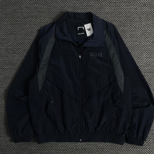 골스튜디오 리플렉티브 로고 디테일 바람막이 자켓o 3600