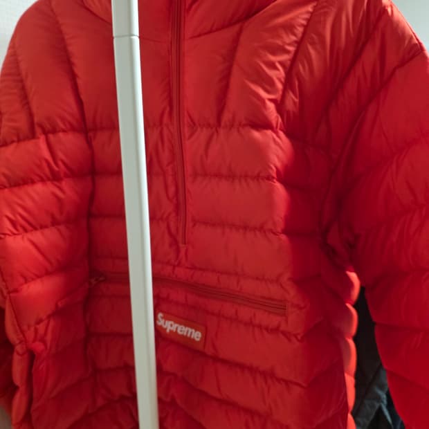 슈프림 마이크로 다운 하프 집 오렌지-s size
