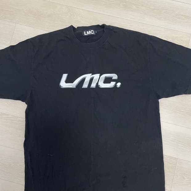 LMC chrome emblem TEE