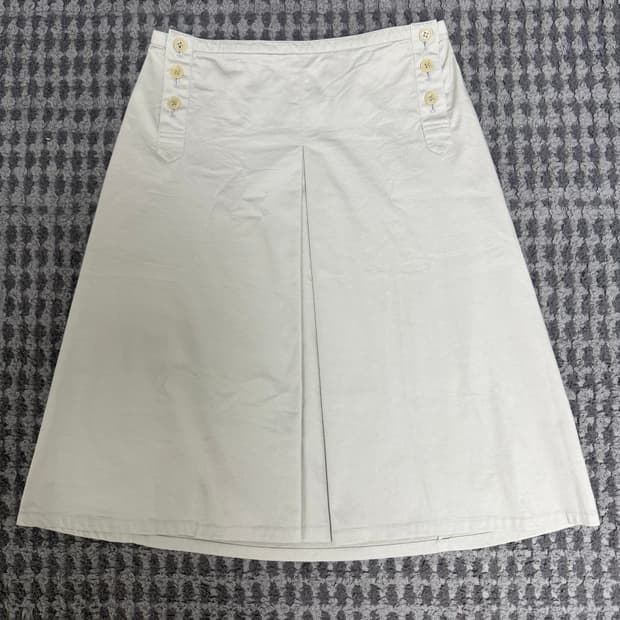 츠모리치사토 사이드버튼 플리츠 스커트