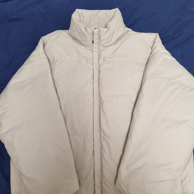 [어나더오피스] 스노우맨 다운 자켓(Almond Milk)