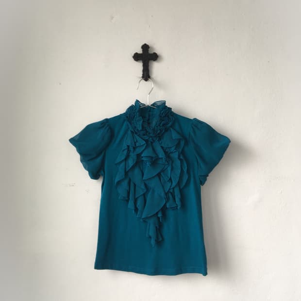 Ruffle point high neck top