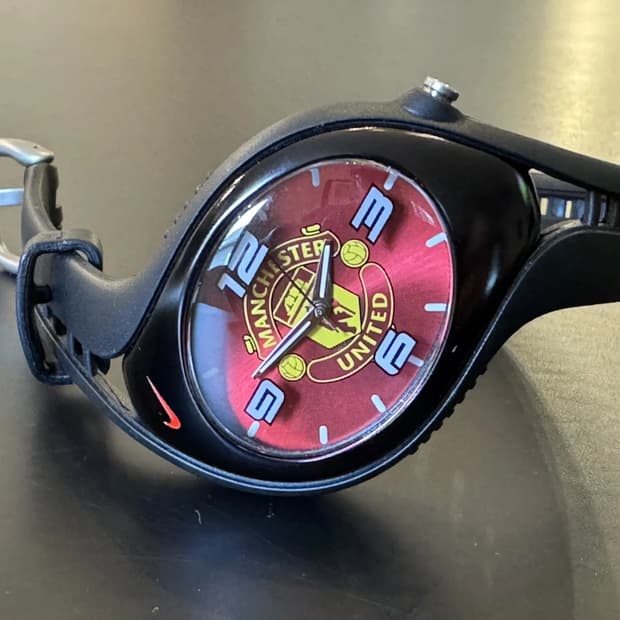 나이키 트라이액스 맨체스터 유나이티드 워치
