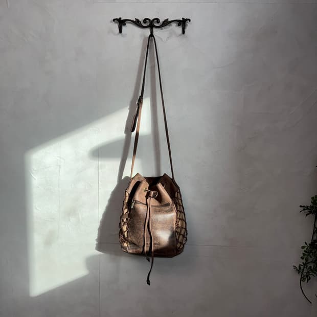 Renoma brown net drawstring cross bag