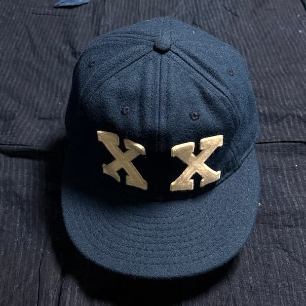 이벳필드 ‘XX' 아플리케 볼캡 OS