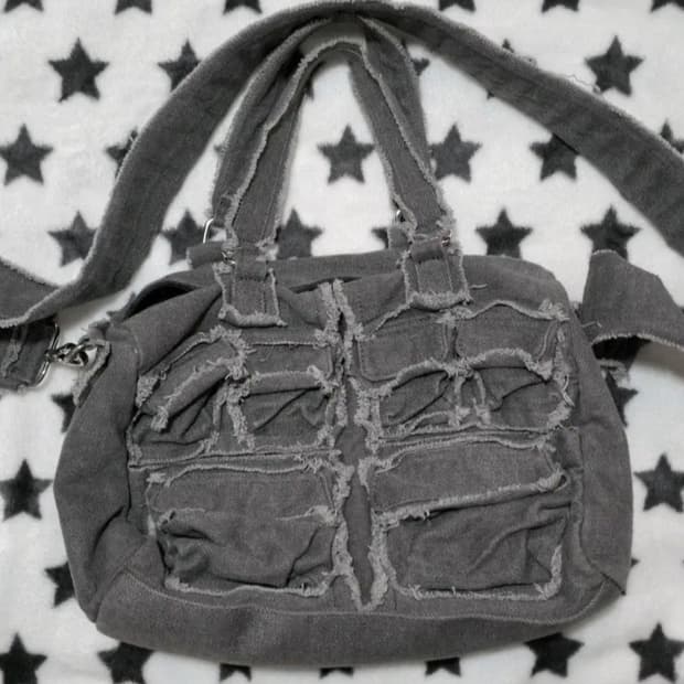 와이이이엘 DAMAGE MULTI-POCKET CARGO BAG