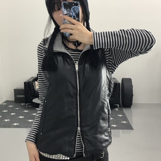 And A Poly Reversible Vest Jumper 