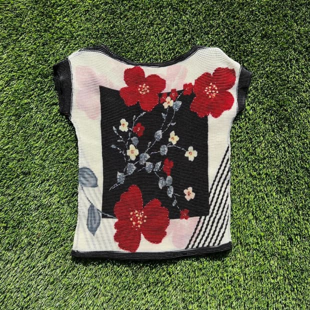 Issey Miyaki style pleated blouse