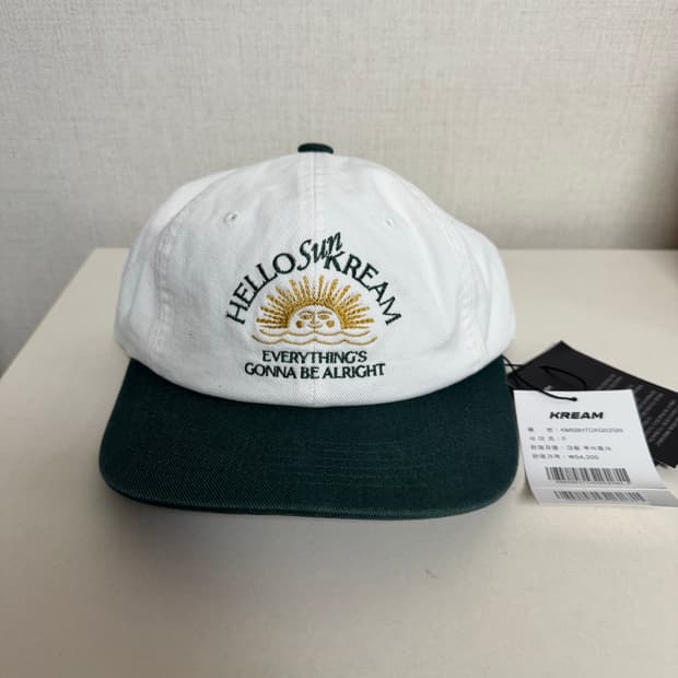 KREAM 머치 헬로 선 크림 릴렉스드 핏 아치 로고 6패널 캡 오프 화