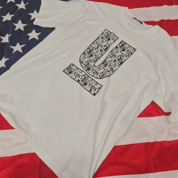 언더커버 로고 반팔 티셔츠