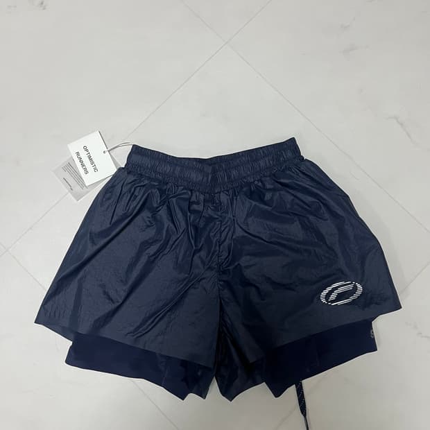 옵티미스틱 러너스 서울 레이스킷 쇼츠 (XXS)