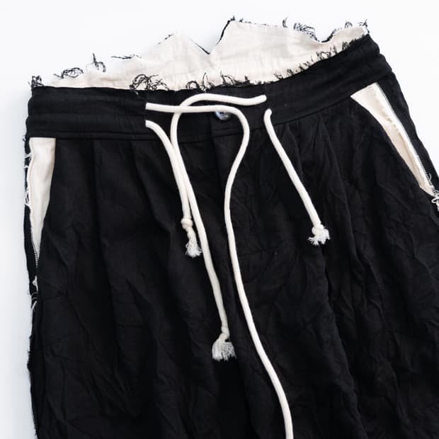 Faineant (페네앙) 인앤아웃 절개 디테일 울 혼방 와이드 팬츠 (