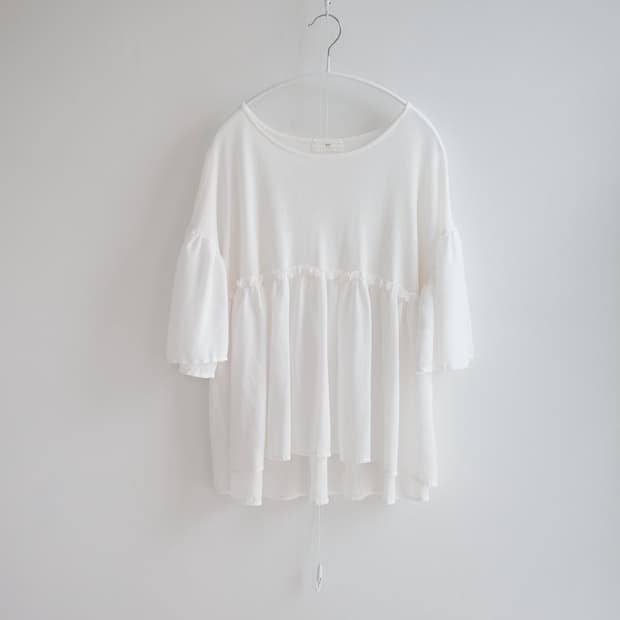  Ivory frill-trimmed peplum blouse