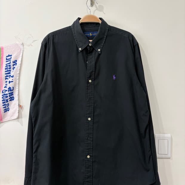 82. 폴로 검정 셔츠