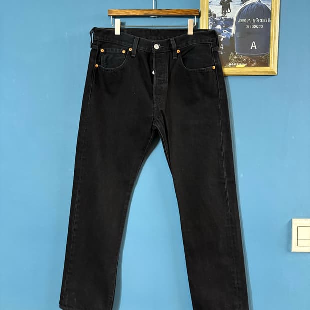 00‘s Levi's 501 Black denim pant.