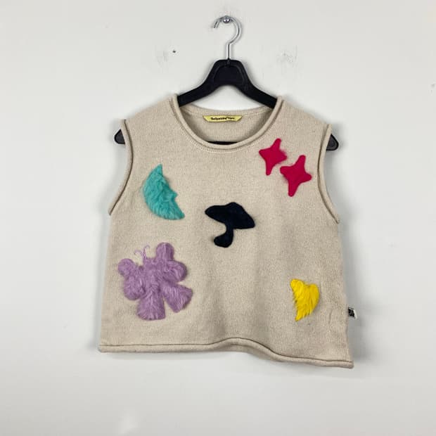 더 스파클링 웨이브 니트 조끼 베스트 