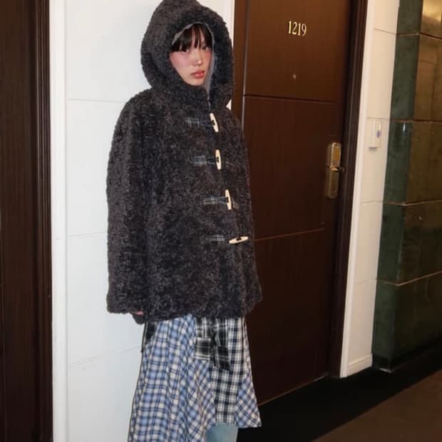 The museum visitor fur jacket