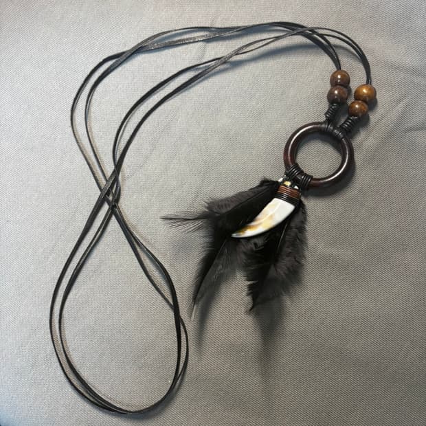 Wolf tooth feather necklace