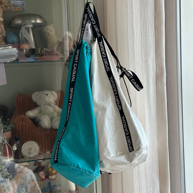 헤리티지플로스 페이턴트 스포츠백 화이트