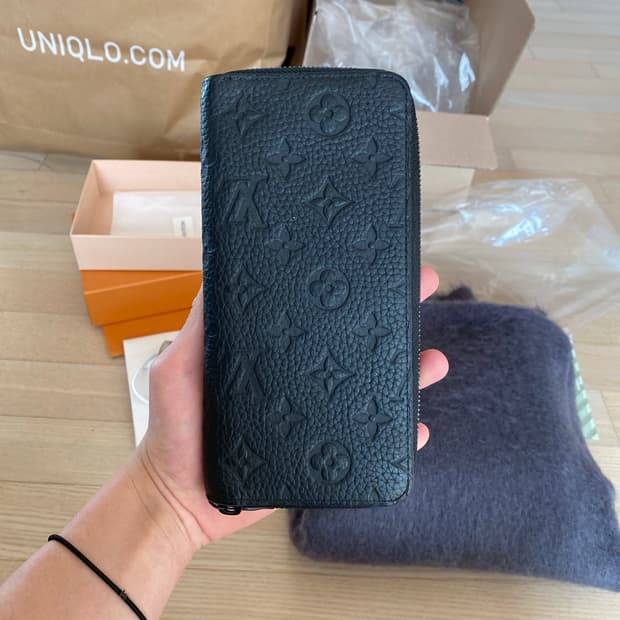 루이비통 토뤼옹 모노그램 지퍼 장지갑