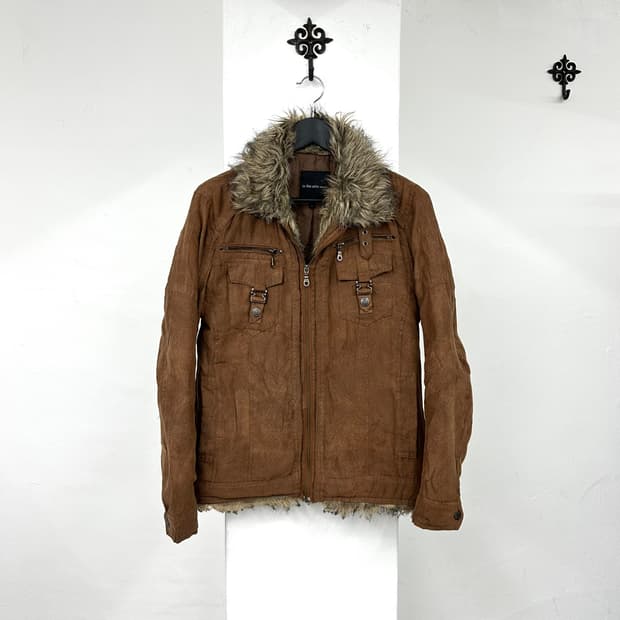 In the attic brown fur jacket