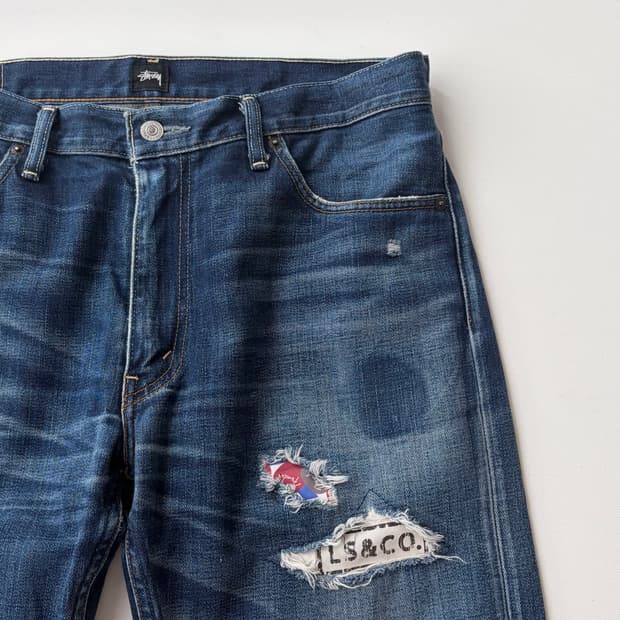 [STÜSSY 20th] 스투시 x 리바이스 SS505 셀비지 데님 팬츠