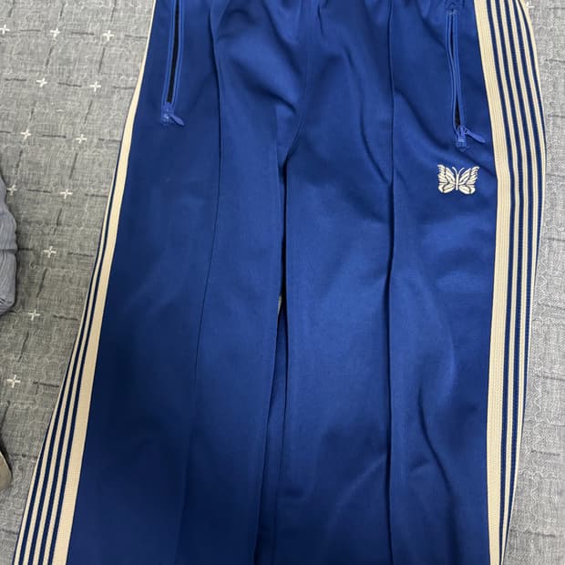 [M]니들스 트랙팬츠 폴리 스무스 로얄