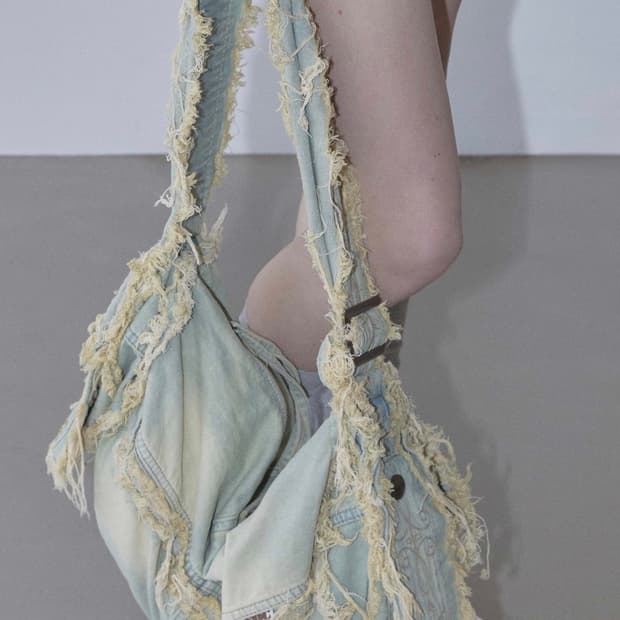 Sculptor Destroyed Denim Duffel Bag