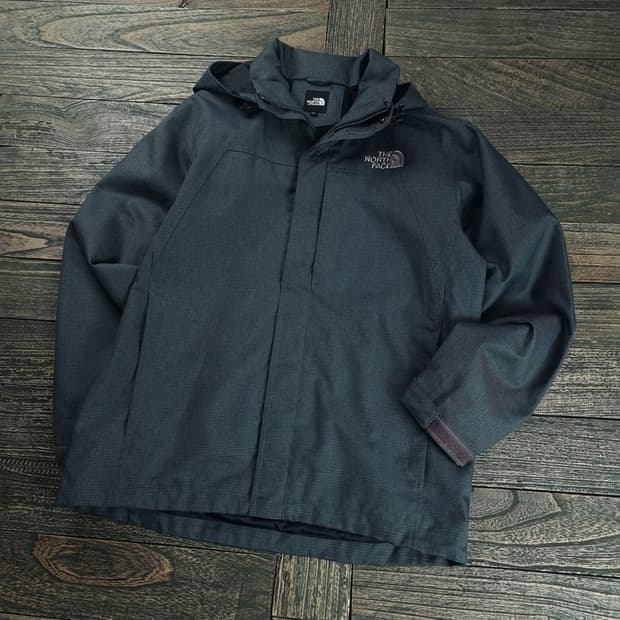 [노스페이스] 로고 자수 체크 패턴 후드 바람막이 자켓 M18751