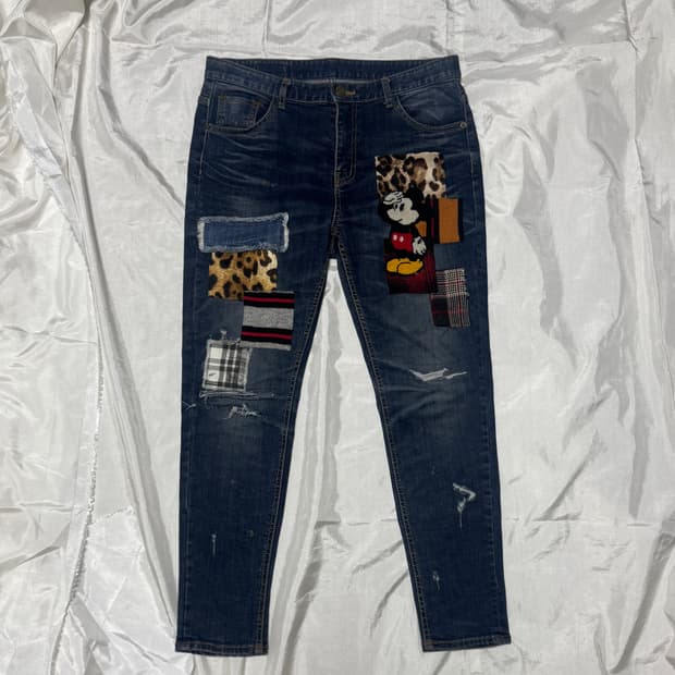 Patchwork character denim jeans