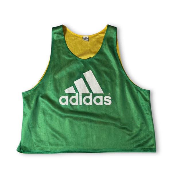 아디다스 매쉬 리버시블 슬리브리스 100