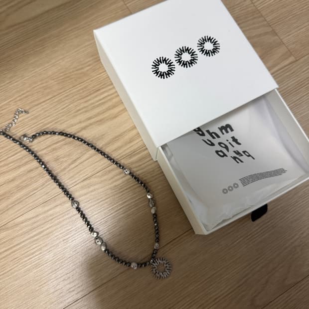 999휴머니티 PEBBLE SYMBOL NECKLACE