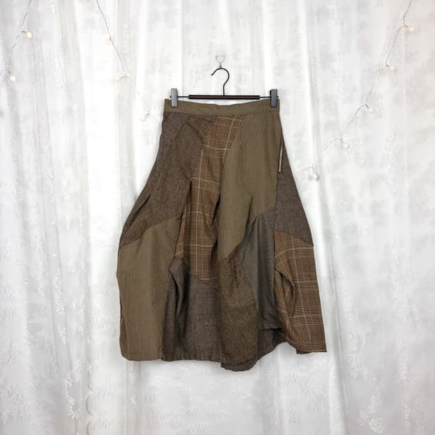 Asymmetrical patchwork tweed wool skirt