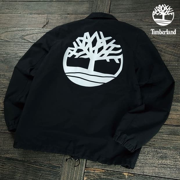 [팀버랜드] 뒷판 빅로고 프린팅 코치 자켓 블랙 M19057