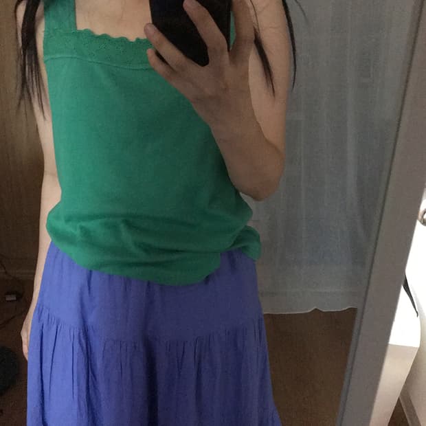 009. green sleeveless top