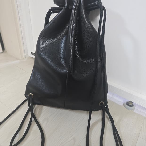 올레더 스트링 백팩 