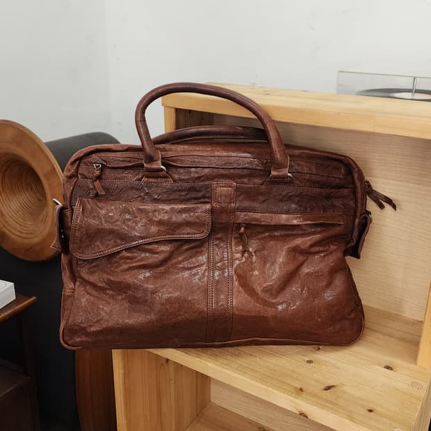 솔리드 옴므 우영미 브라운 가죽 서류가방