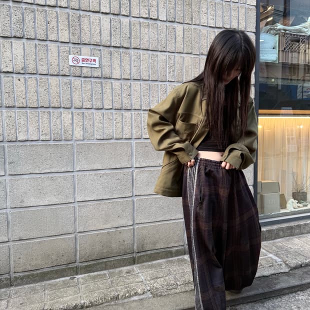 니들스 23FW 체크 브라운 HD 트랙팬츠