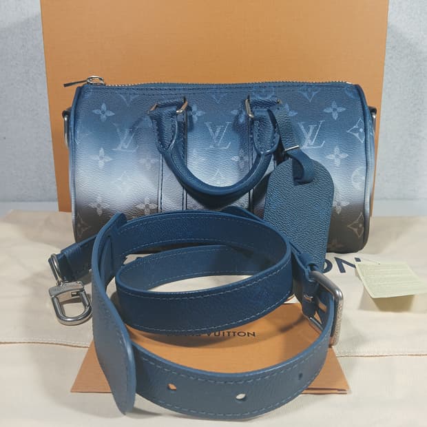 루이비통 키폴 반둘리에 25 토트백 M28026