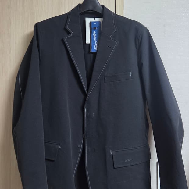 and wander plain tailored stretch jacket