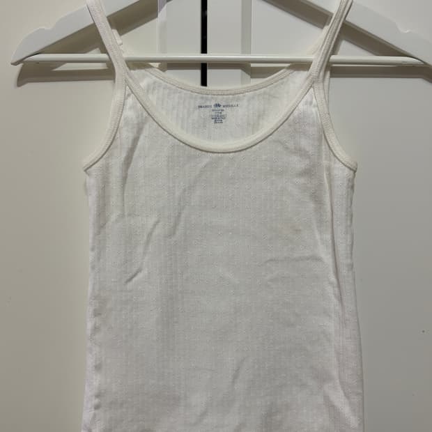 브랜디멜빌 화이트 펀칭 슬리브리스