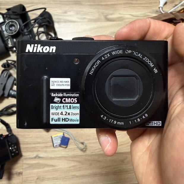 니콘 p300