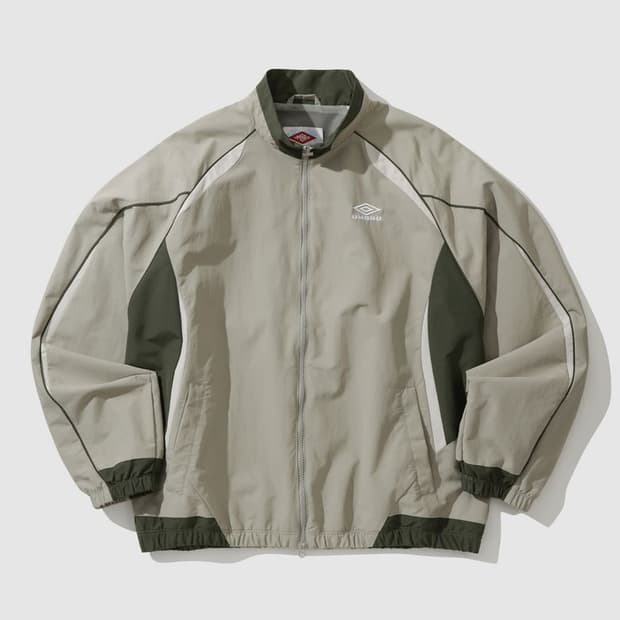 엄브로 hbl celeb 스탠넥 바람막이 베이지